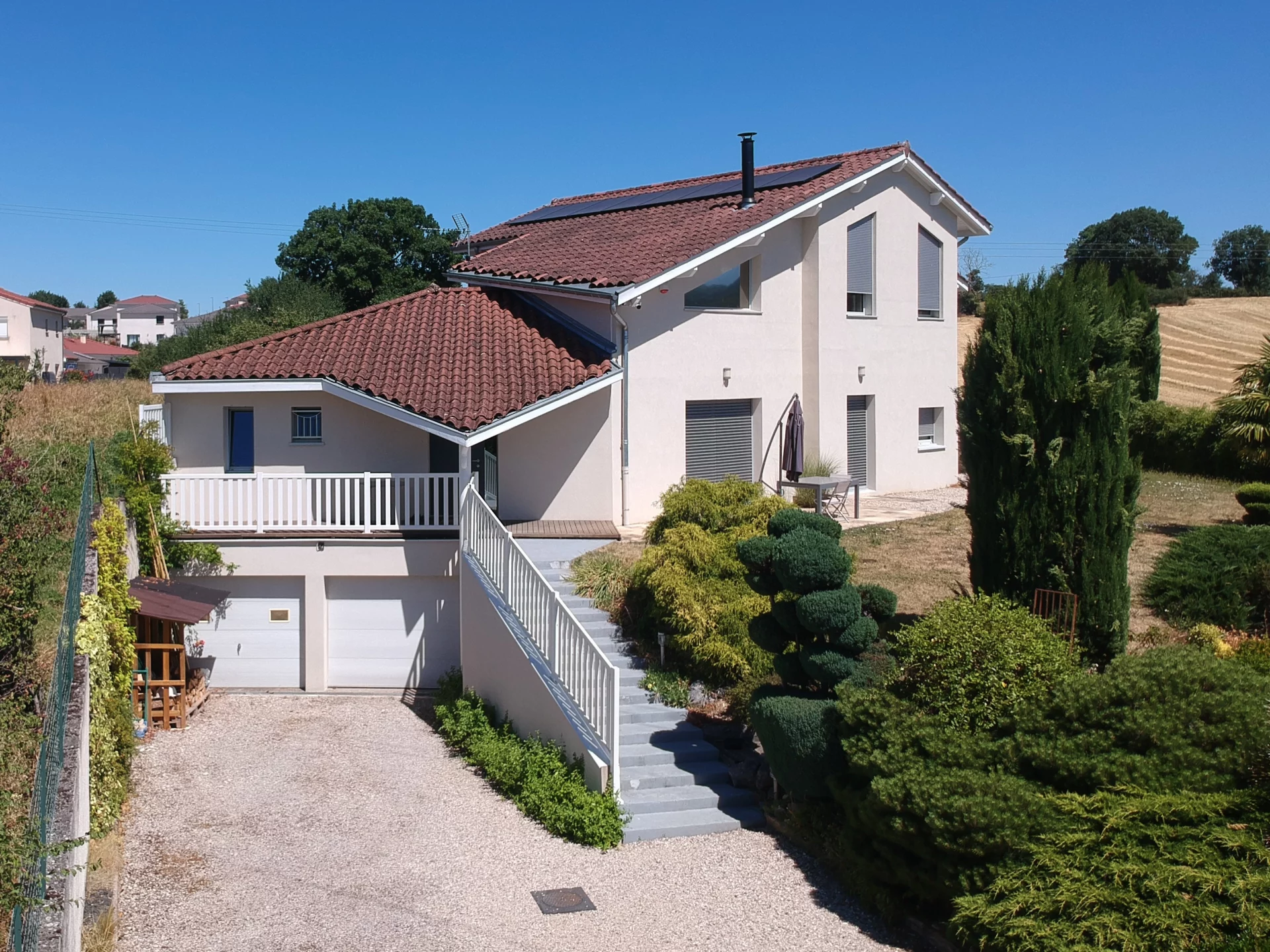 Rénovation et surélévation d'une maison individuelle à Meximieux